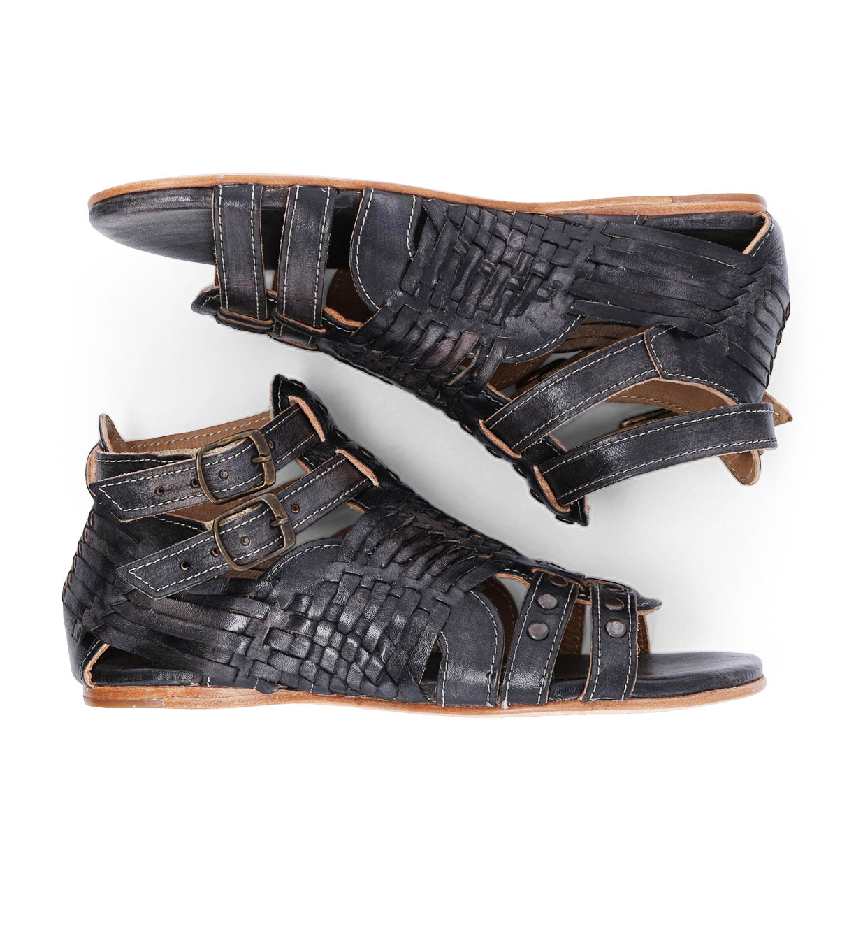 A pair of black Claire gladiator sandals with straps and buckles by Bed Stu.
