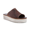 A women's brown leather slide sandal with a white outsole, the Fairlee II by Bed Stu.