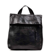 A black leather Howie backpack on a white background, by Bed Stu.