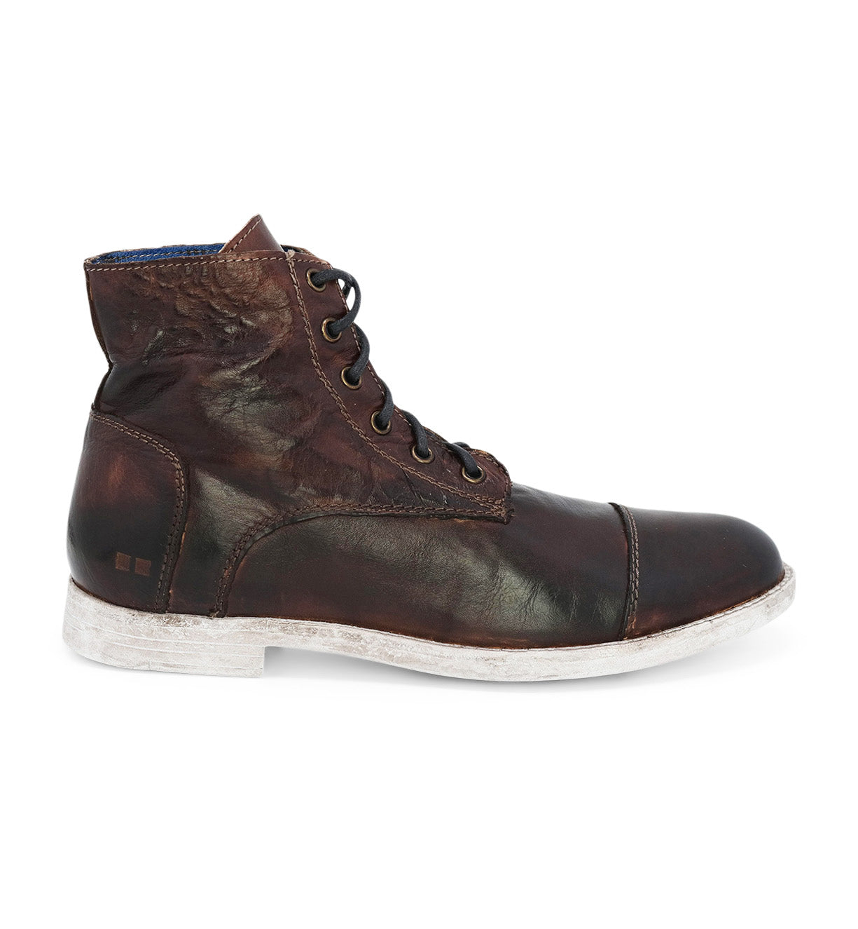 A men's brown leather boot with white soles, the Leonardo by Bed Stu.