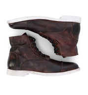 A pair of Bed Stu Leonardo brown leather boots on a white background.