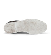A pair of Leonardo shoes with white soles on a white background by Bed Stu.