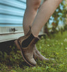 A woman wearing Nandi taupe pure leather chelsea boots.