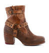A women's Bedford II ankle boot with buckles and a wooden heel.