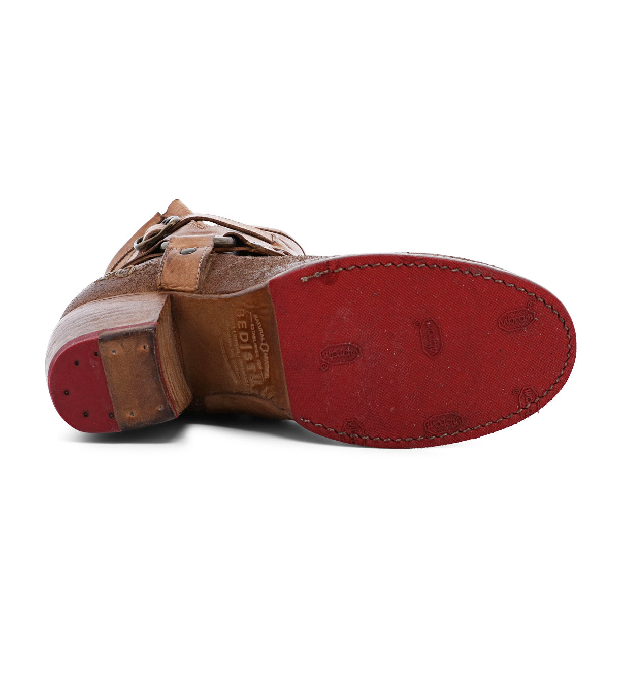 A pair of Octane II cowboy boots with red soles by Bed Stu.