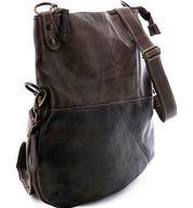 A brown and black Tahiti leather bag with a strap from Bed Stu.