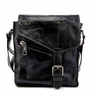 A Venice Beach black leather messenger bag with an adjustable strap, made by Bed Stu.