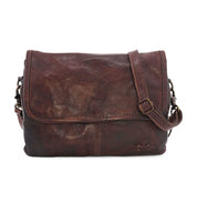 A brown leather Ziggy messenger bag with a shoulder strap by Bed Stu.