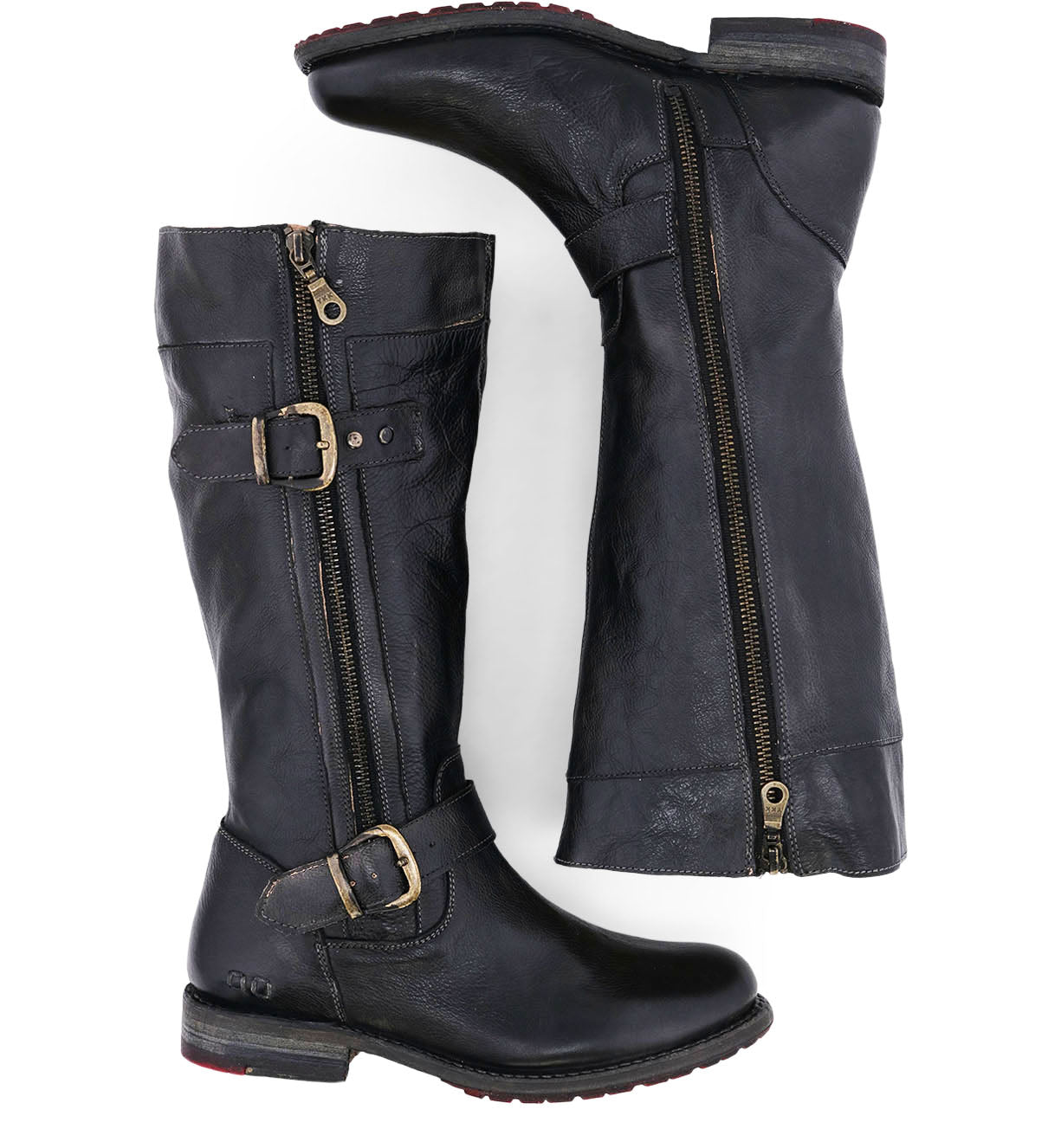 A pair of Bed Stu Gogo Lug Wide Calf black leather boots with buckles and zippers.
