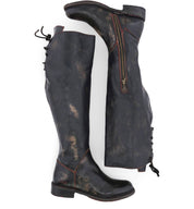 A pair of Bed Stu Manchester Wide Calf black leather boots with zippers on the side.