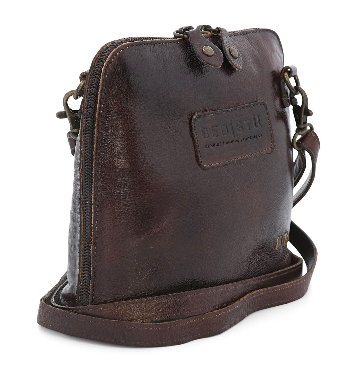 A brown leather Ventura cross body bag with a strap by Bed Stu.