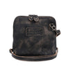 A black Bed Stu Ventura cross body bag with a leather strap.