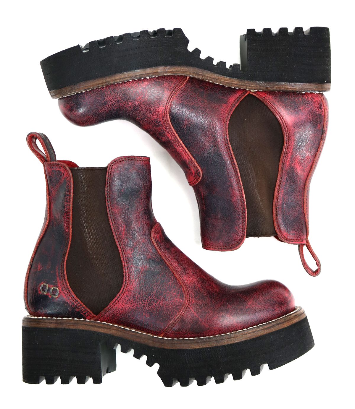 A pair of Bed Stu Valda Hi red leather Chelsea boots with black elastic side panels and thick, treaded platform soles, displayed side by side and upside down.