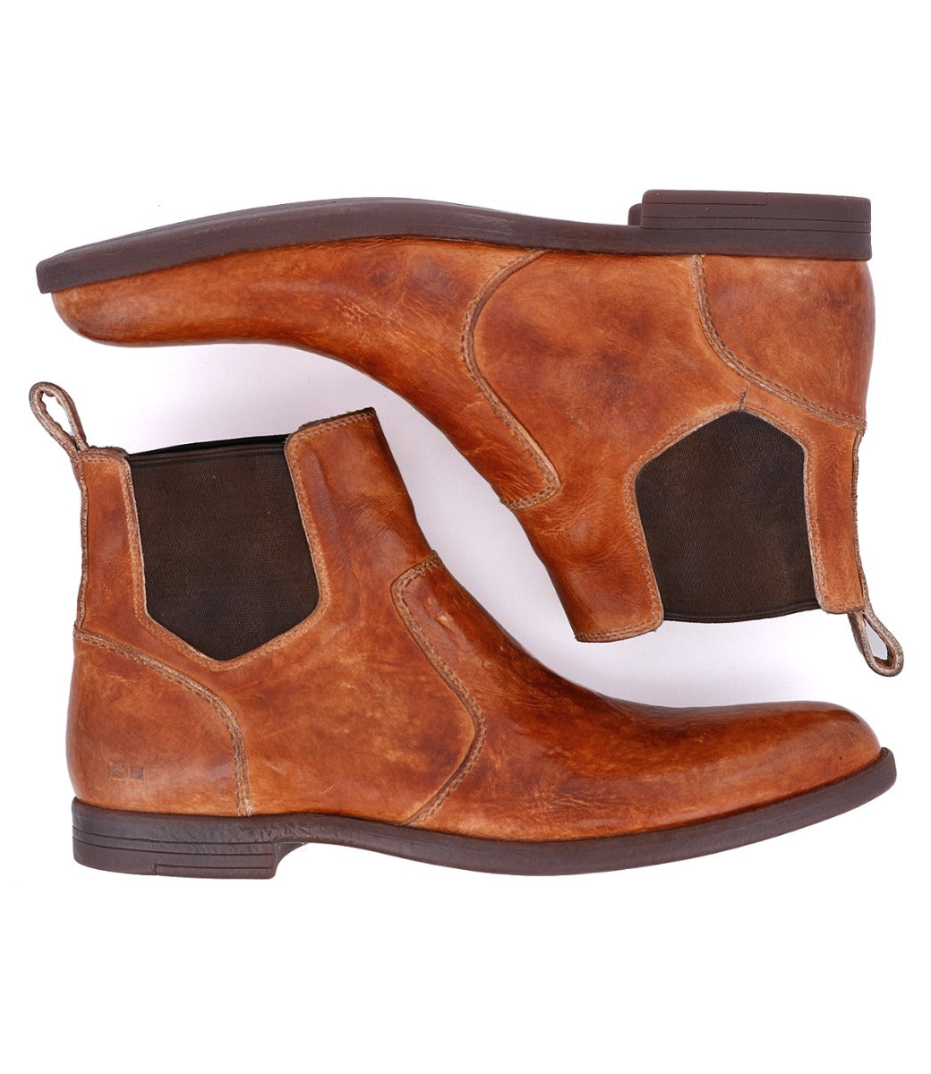 A pair of Vasari brown leather chelsea boots on a white background. (Brand: Bed Stu)