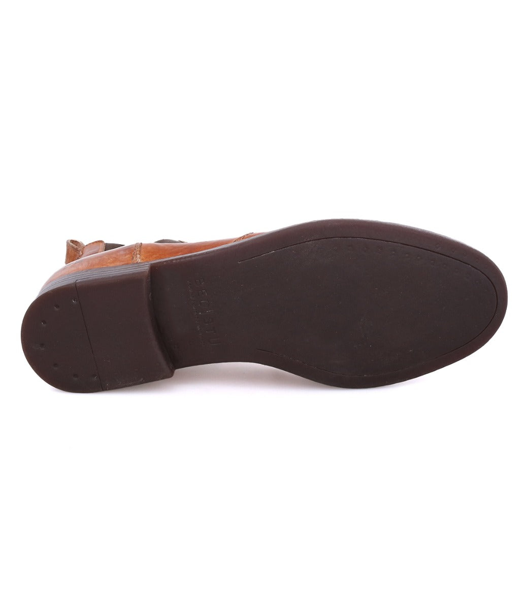 A pair of Vasari brown shoes with black soles on a white background by Bed Stu.