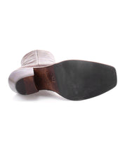 A pair of high-quality Vendue leather boots with a sleek silhouette on a white background.