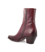 A sleek silhouette Vendue burgundy leather ankle boot with a square toe on a white background from Bed Stu.
