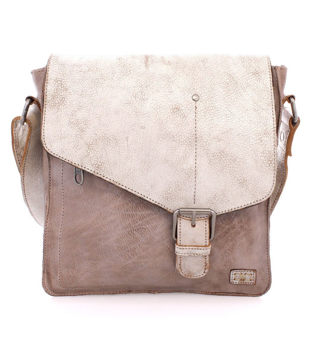A Venice Beach leather messenger bag with an adjustable strap, made by Bed Stu.