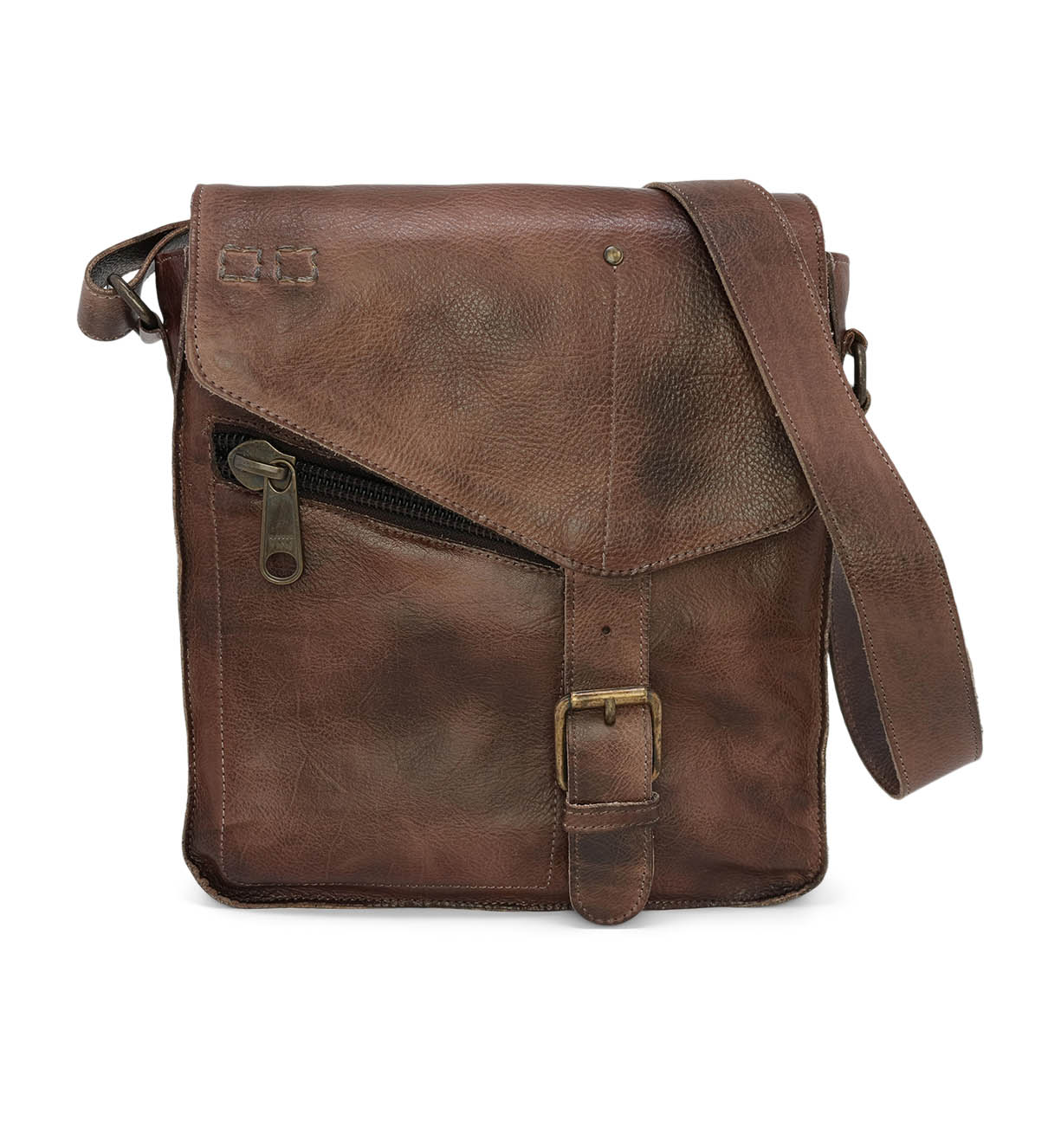 The Bed|Stü Venice Beach is a brown full-grain leather crossbody bag featuring a zippered front pocket, buckle detail, and an adjustable strap, photographed against a white background.