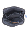 The inside of a black leather gem purse with blue zippers and a Bed Stu Ventura cross-body design.