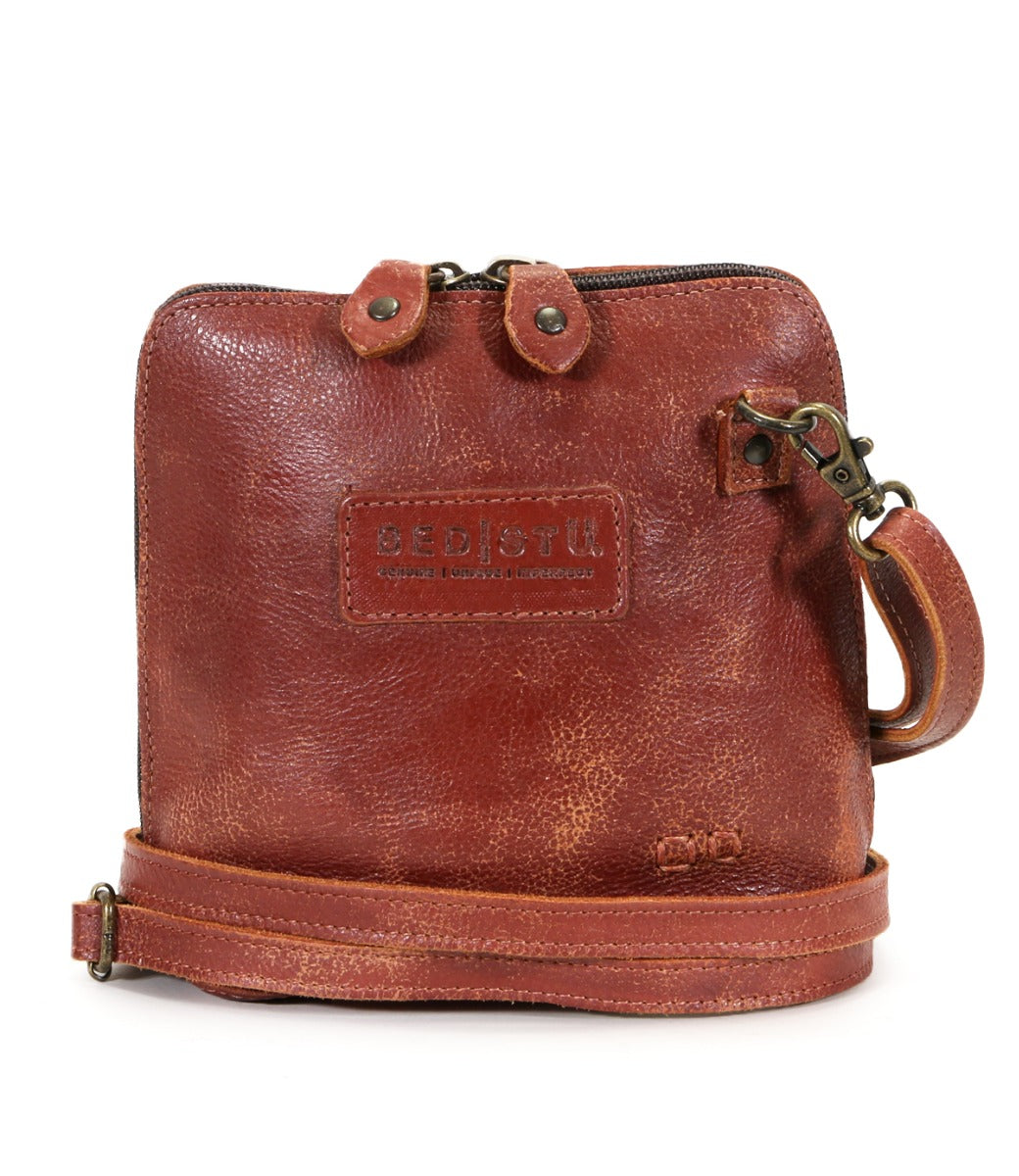 A brown leather Ventura cross body bag with a strap, by Bed Stu.