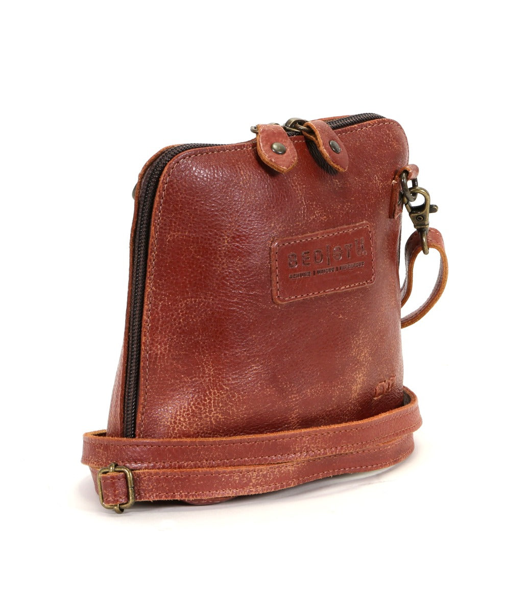 A Ventura brown leather cross body bag with a strap by Bed Stu.