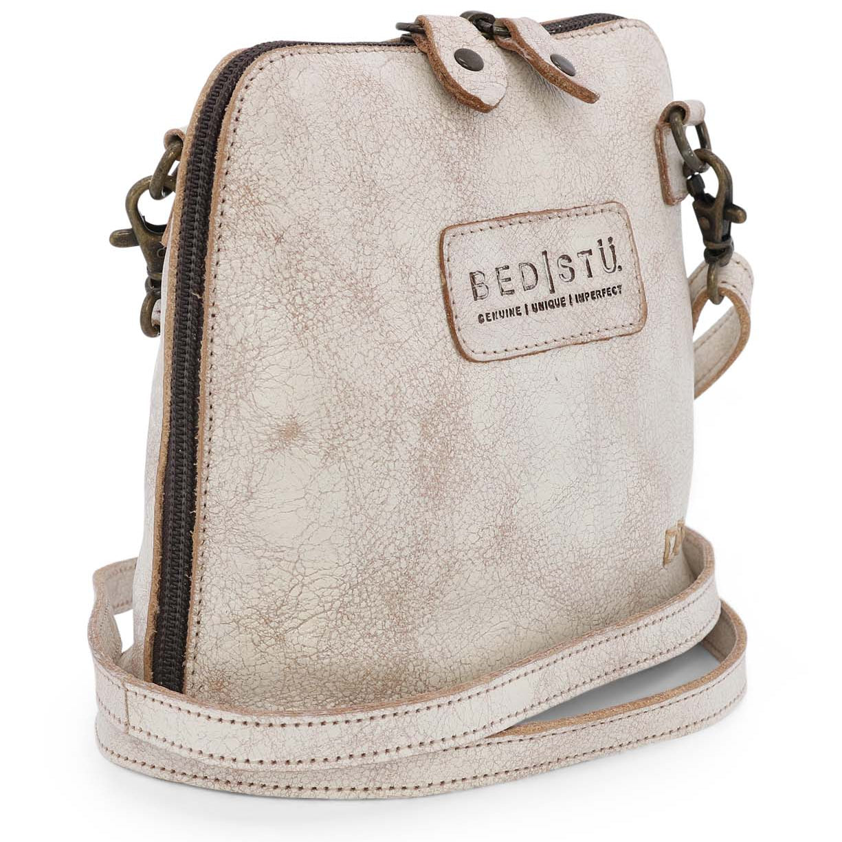 A white leather cross body bag with the word Ventura by Bed Stu on it.