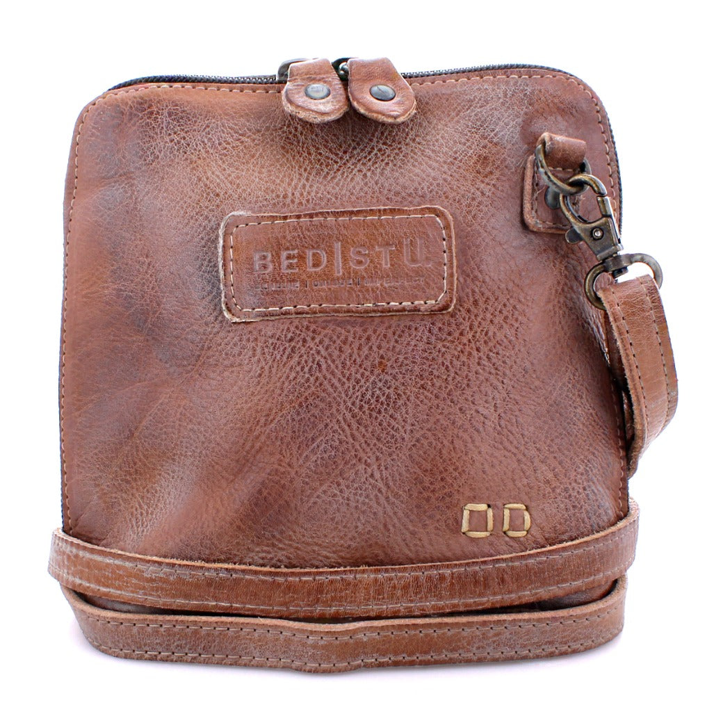 A brown leather Ventura cross body bag with a Bed Stu strap.