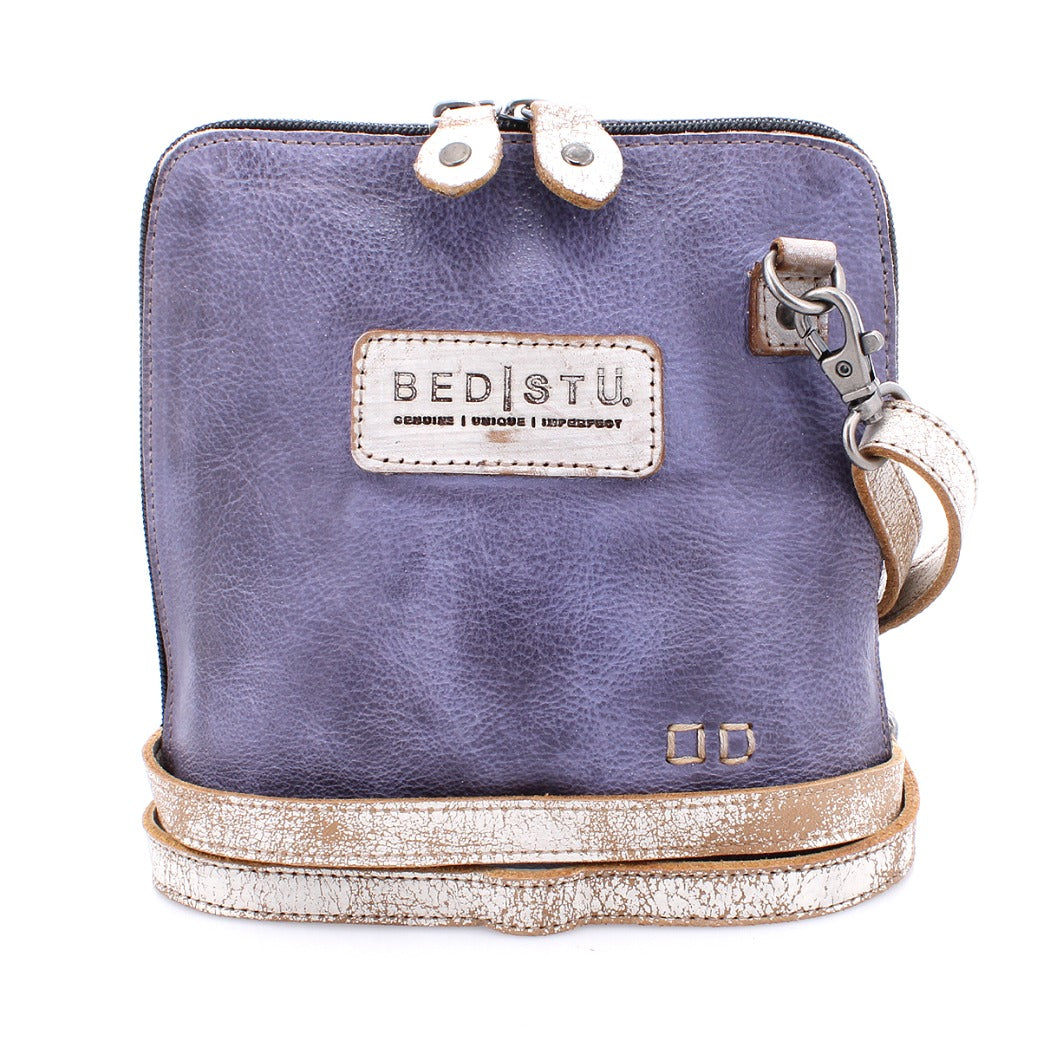 A Ventura cross body bag with a gold strap. (Brand: Bed Stu)