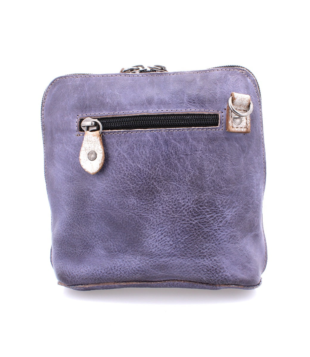 A purple leather Ventura cross body bag with a zipper by Bed Stu.