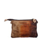 A Viana clutch bag by Bed Stu, made of brown leather with a zipper.