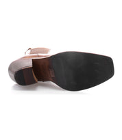 A close up view of a woman's Viscera shoe with Bed Stu Italian Chelsea boot style.