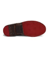 A Rose by Bed Stu men's shoe with a red sole.
