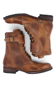 A pair of brown, vegetable tanned leather Walker boots by Bed Stu with laces and a buckle, viewed from above on a white background.