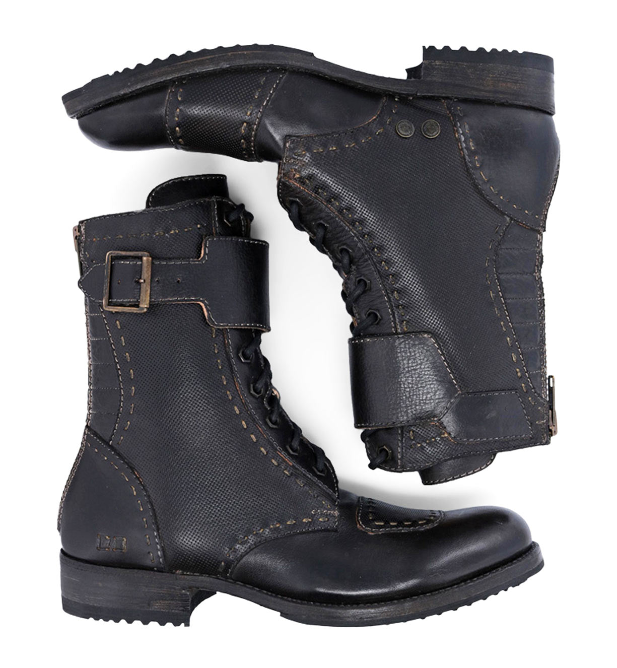 A pair of Bed Stu black leather boots with buckles.