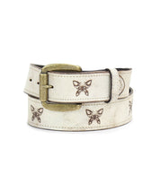 Introducing the Wander by Bed Stu, a white leather belt adorned with butterflies embossed along its length and featuring a brass buckle, offering a touch of whimsical charm.