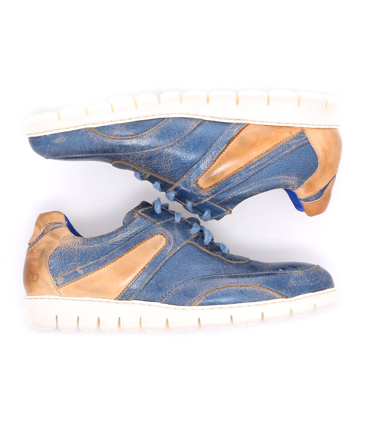A pair of blue and tan distressed lace-up Wardell sneakers by Bed Stu.