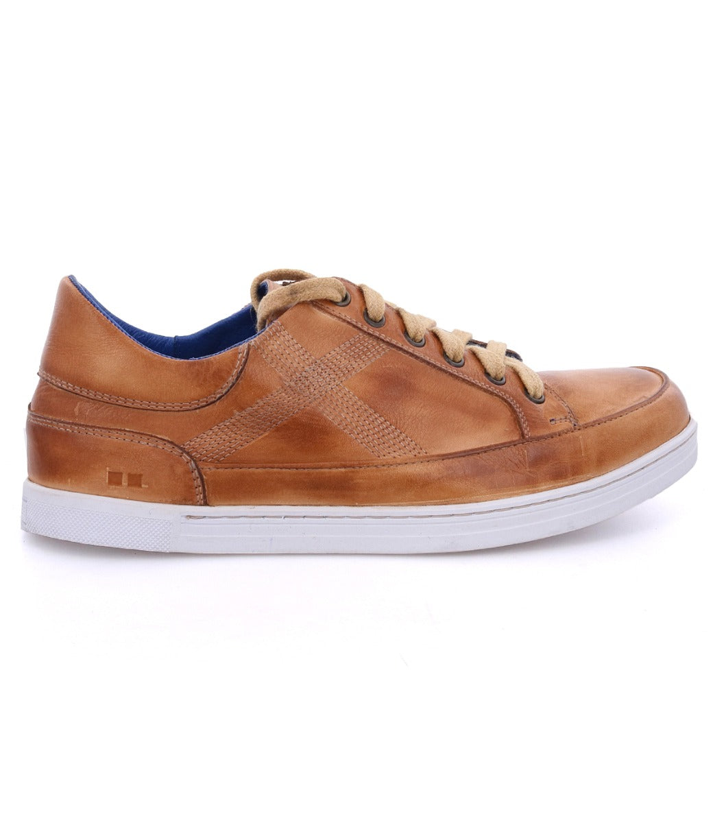 A Bed Stu men's tan leather sneaker with blue laces.