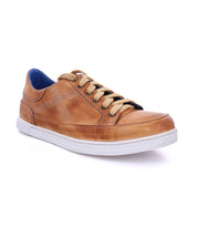 A men's Wizard leather sneaker from Bed Stu with blue laces.
