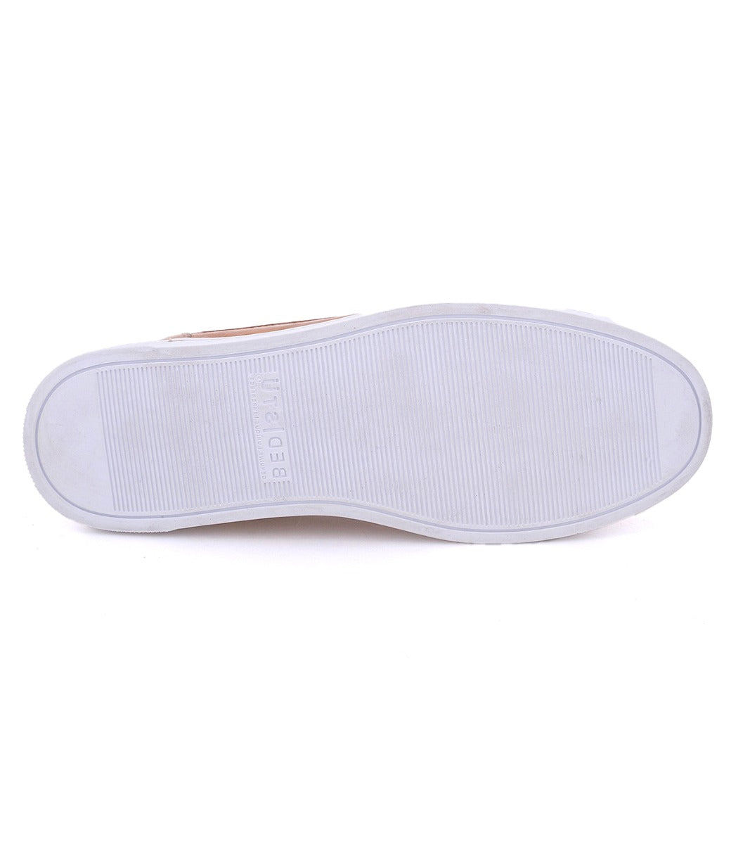 A pair of Bed Stu Wizard shoes with white soles on a white background.
