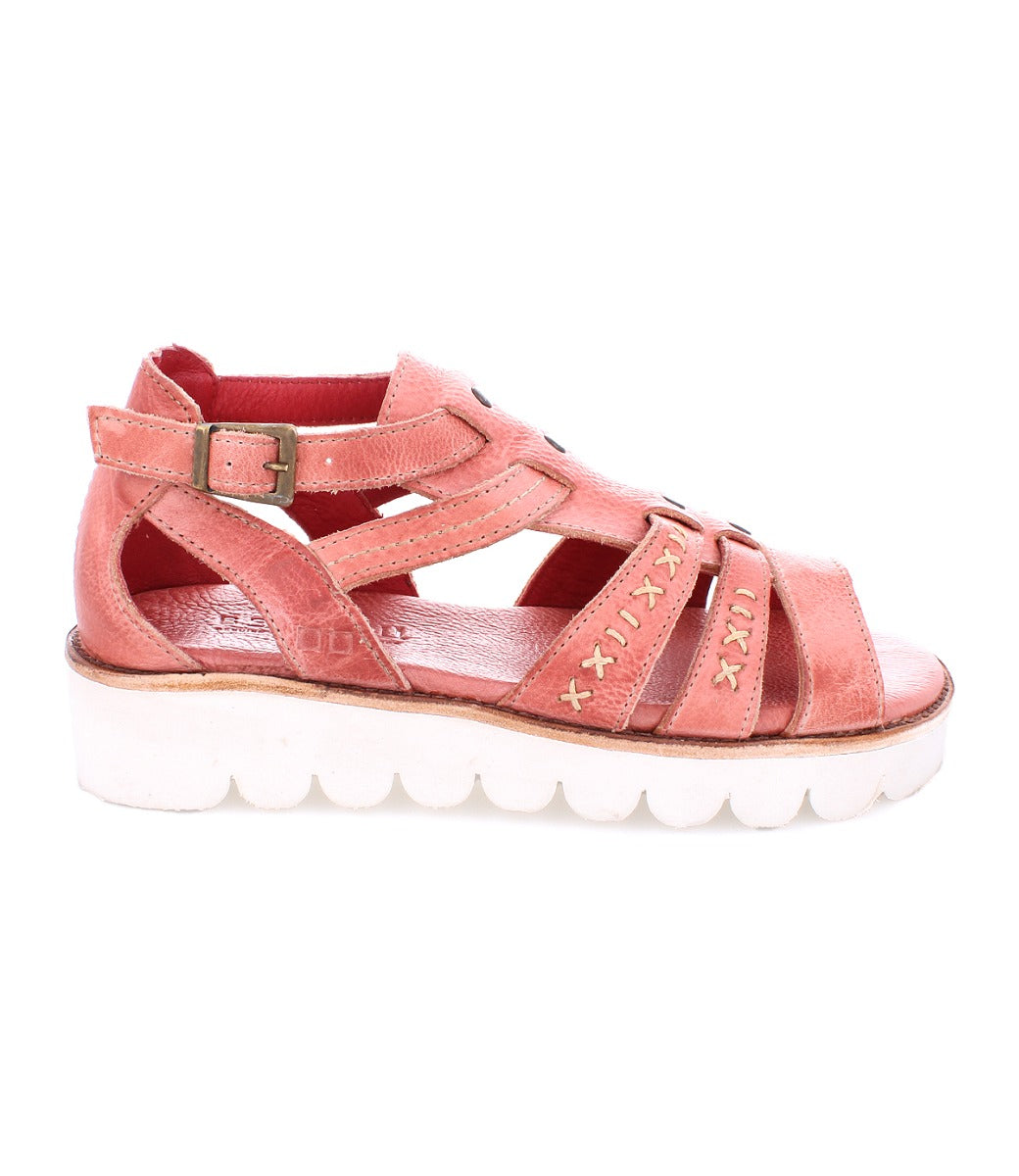 A women's pink Wonder sandal with straps and a white sole by Bed Stu.