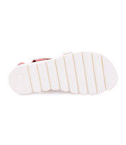 A pair of Bed Stu Wonder sandals with white soles on a white background.