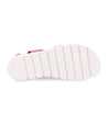A pair of Bed Stu Wonder sandals with white soles on a white background.