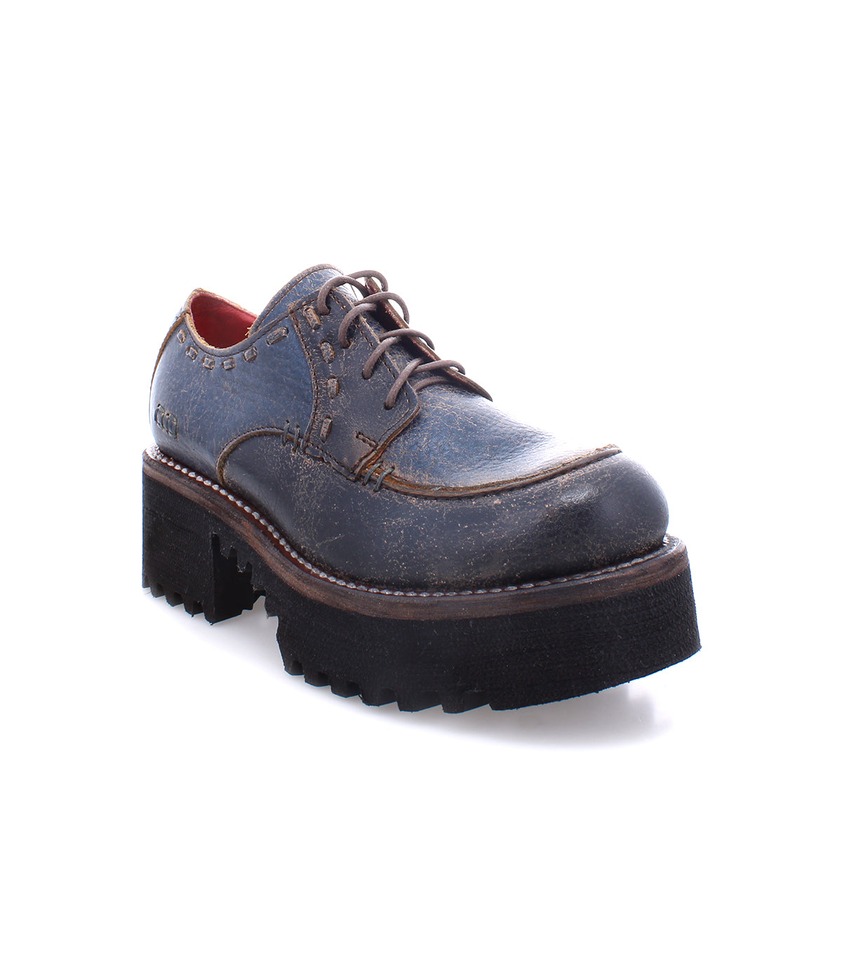 A Bed Stu men's blue oxford shoe with a black sole and platform lace-up.