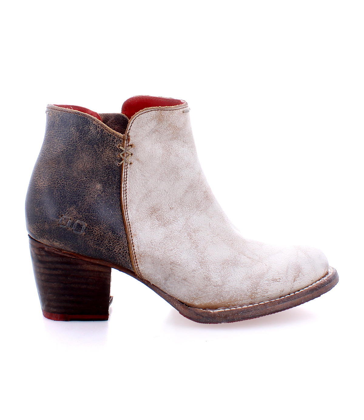 A women's leather ankle boot with a red heel that showcases fine craftsmanship Bed Stu Yell.