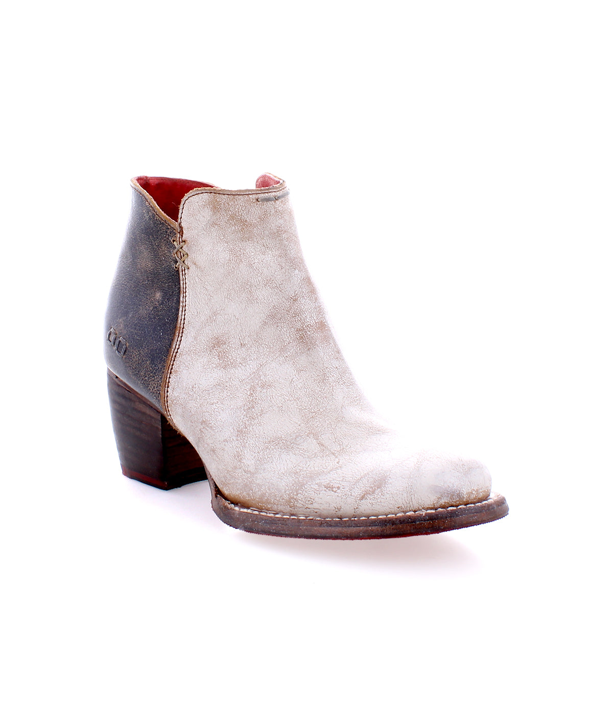 A durable women's Yell ankle boot handcrafted in white and black leather by Bed Stu.