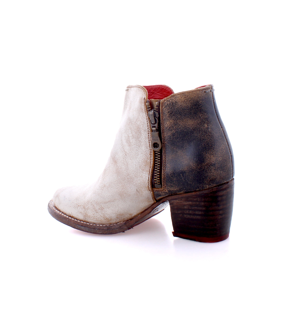 A women's ankle boot with a durable leather construction and side zipper, the Bed Stu Yell.