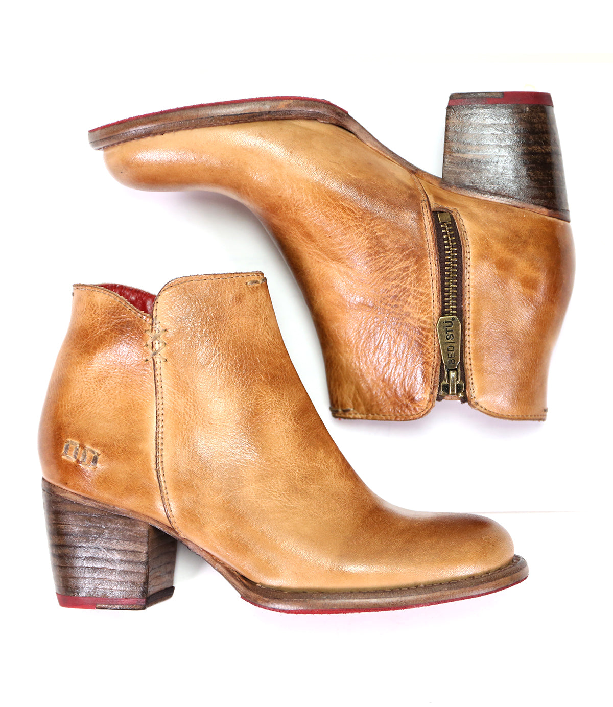 A pair of durable Bed Stu Yell tan leather ankle boots showcasing handmade craftsmanship on a white background.