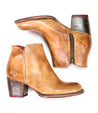 A pair of durable Bed Stu Yell tan leather ankle boots showcasing handmade craftsmanship on a white background.