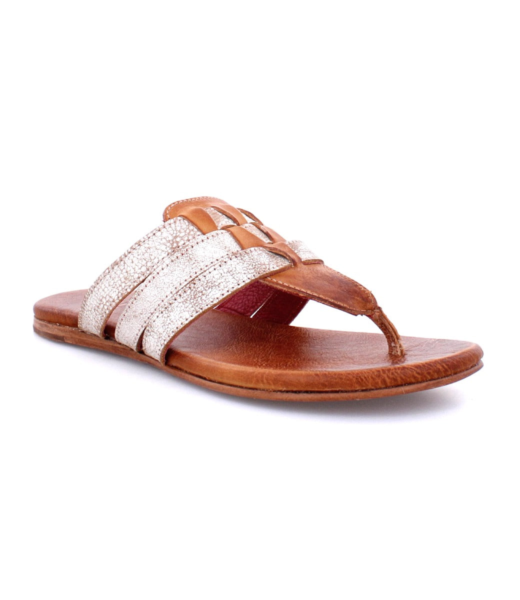 A Yoli sandal with tan and white straps from Bed Stu.